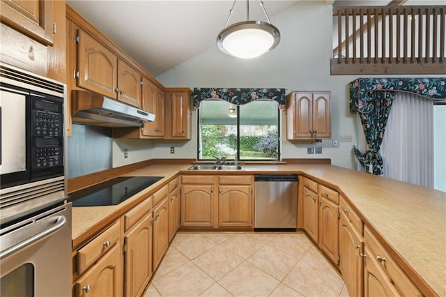 kitchen featuring vaulted ceiling, sink, light tile patterned floors, kitchen peninsula, and stainless steel appliances