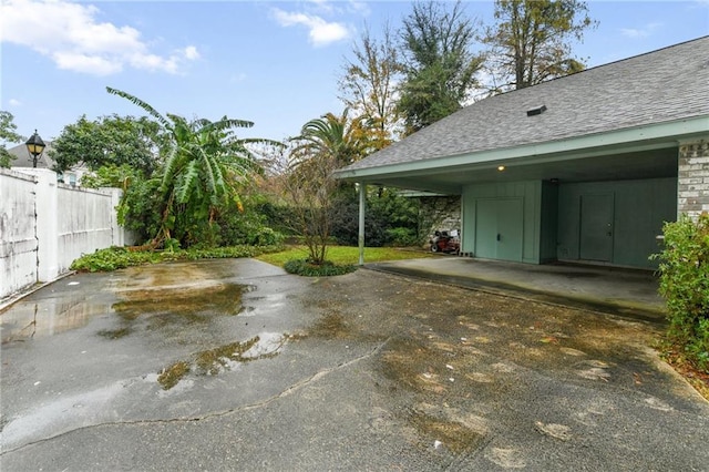 view of patio / terrace featuring a carport