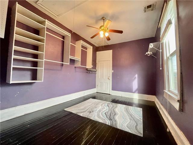 interior space featuring ceiling fan and hardwood / wood-style floors