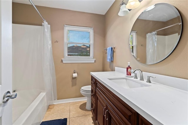 full bathroom featuring tile patterned floors, vanity, toilet, and shower / bath combo with shower curtain