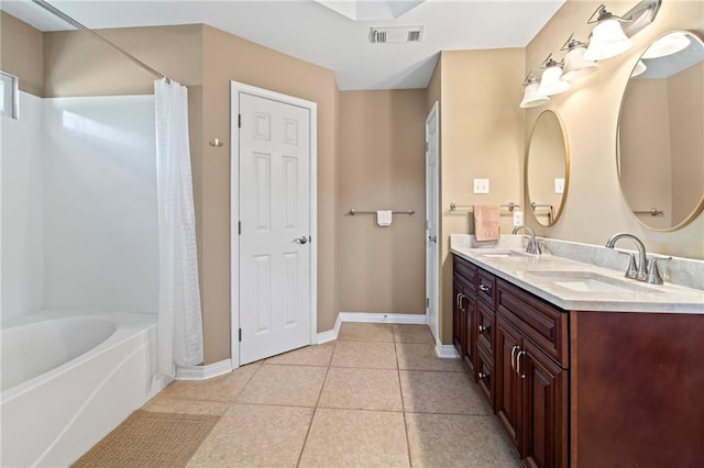 bathroom featuring tile patterned floors and vanity