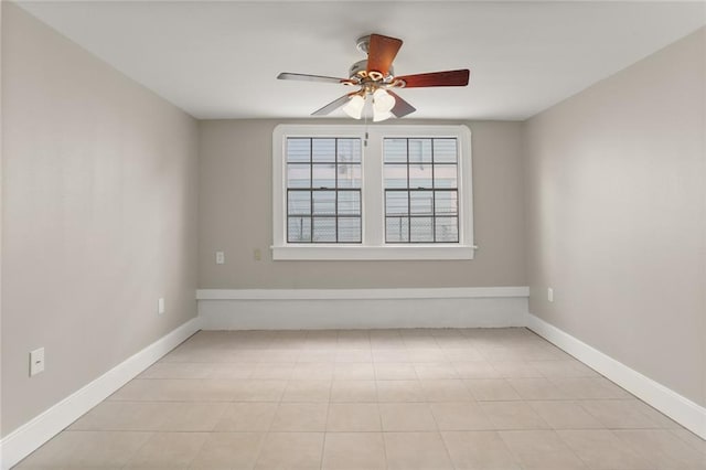 spare room with ceiling fan