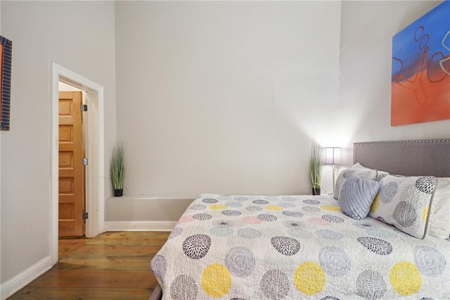 bedroom featuring dark hardwood / wood-style floors