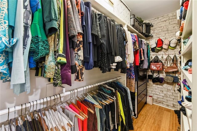 walk in closet featuring light wood-type flooring