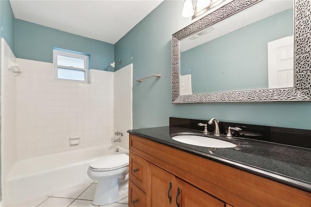 full bathroom with toilet, tile patterned flooring, tiled shower / bath, and vanity