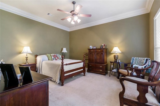 bedroom with ceiling fan, crown molding, and light colored carpet