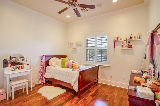 bedroom with ceiling fan, dark wood-type flooring, and ornamental molding