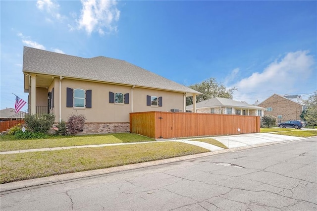 view of property exterior featuring a yard