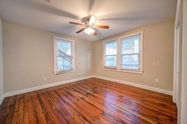 unfurnished living room featuring ceiling fan and light wood-type flooring