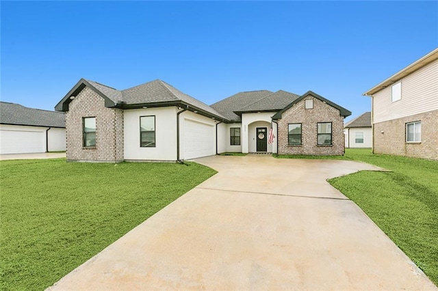 view of front facade with a front yard and a garage