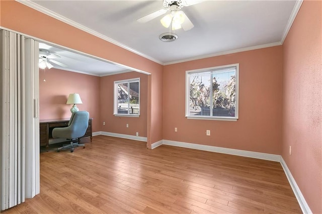 home office featuring ornamental molding, ceiling fan, and light wood-type flooring