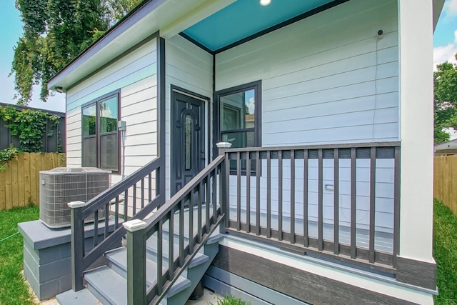 doorway to property featuring central AC