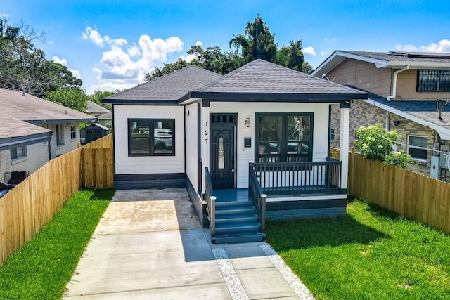 view of front of property with a front lawn