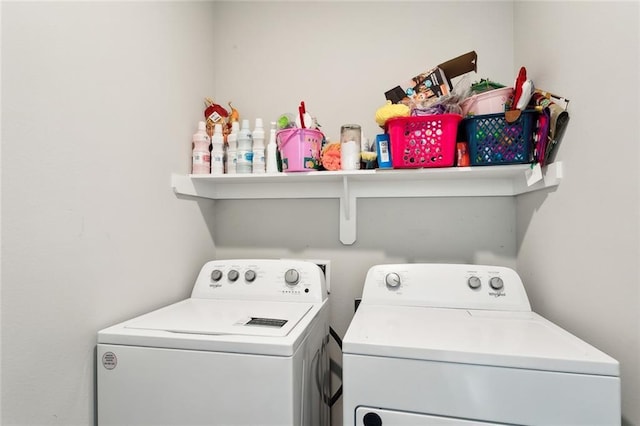 laundry room with independent washer and dryer