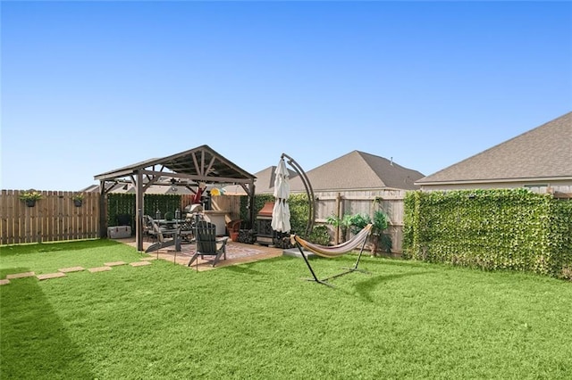 view of yard with a gazebo and a patio