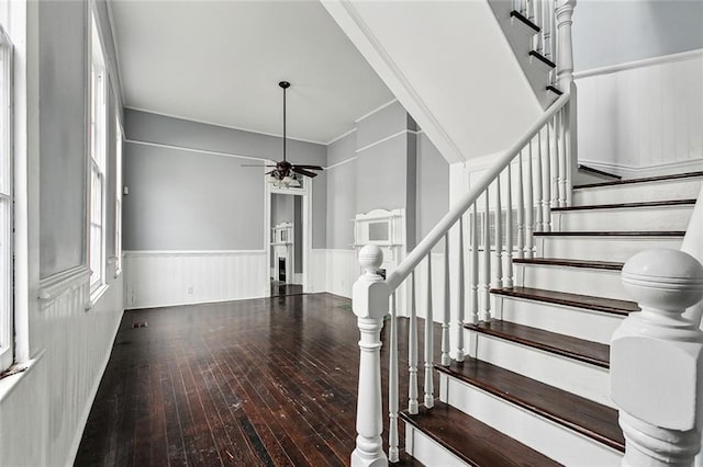 interior space with hardwood / wood-style floors and ceiling fan