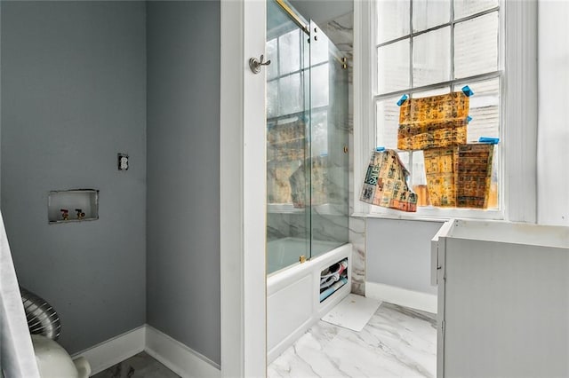 bathroom featuring enclosed tub / shower combo