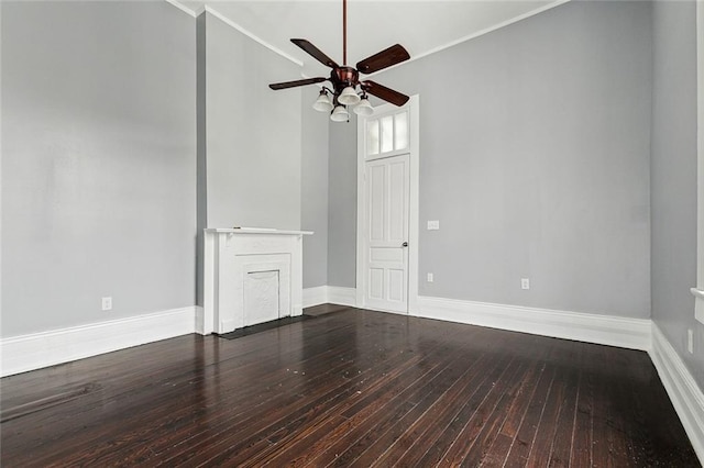 empty room with ceiling fan and hardwood / wood-style flooring