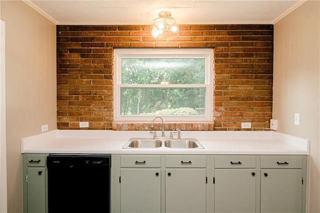 kitchen featuring brick wall, crown molding, black dishwasher, and sink