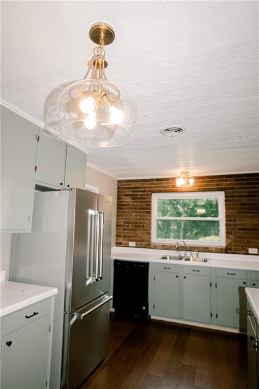 kitchen featuring sink, black dishwasher, hanging light fixtures, dark hardwood / wood-style floors, and high end refrigerator