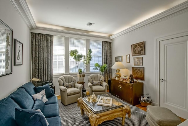 living area featuring ornamental molding