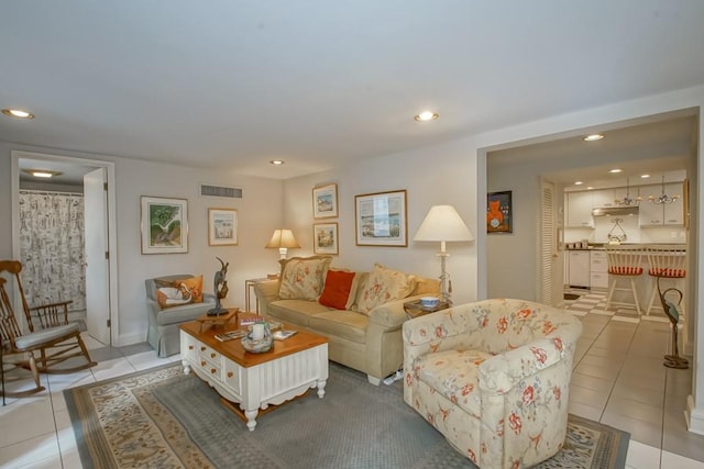 living room with light tile patterned flooring