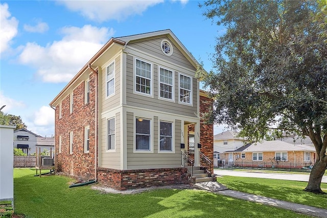 view of front of property featuring a front yard