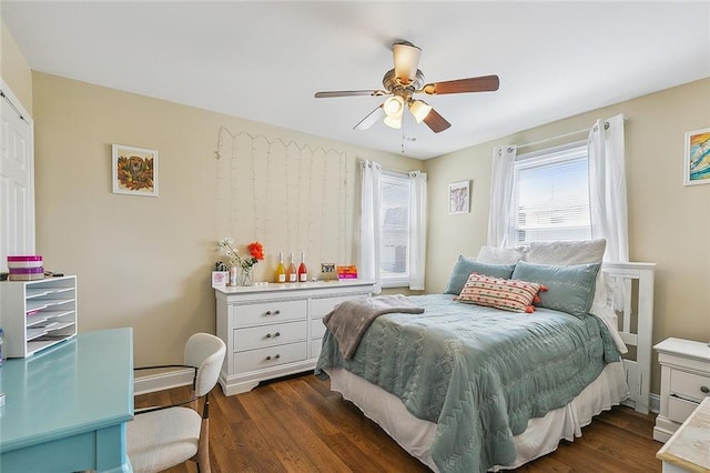 bedroom featuring ceiling fan and dark wood-type flooring