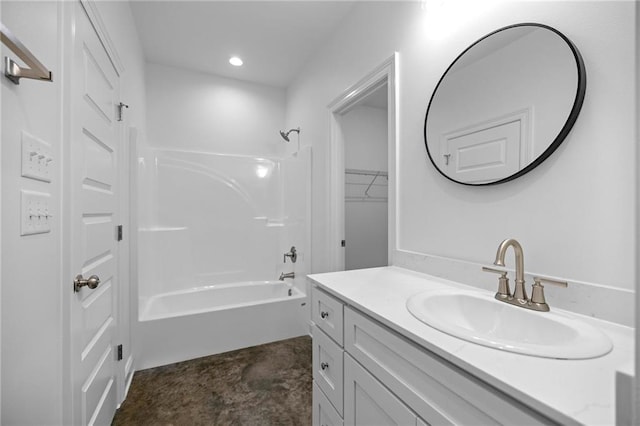 bathroom with bathtub / shower combination and vanity