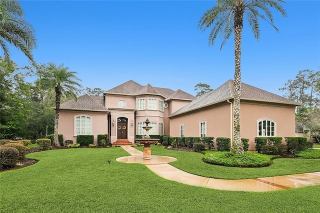 view of front of home featuring a front lawn