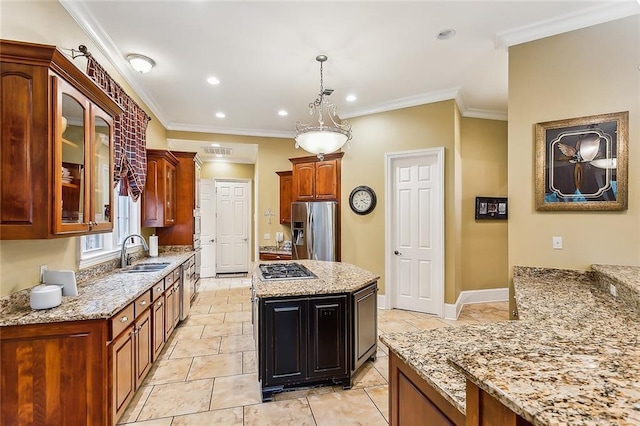 kitchen featuring sink, ornamental molding, light stone countertops, and stainless steel fridge