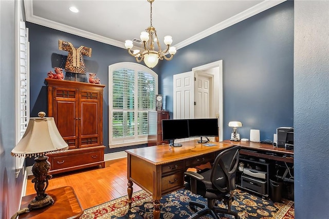 office featuring light wood-type flooring, ornamental molding, and a chandelier