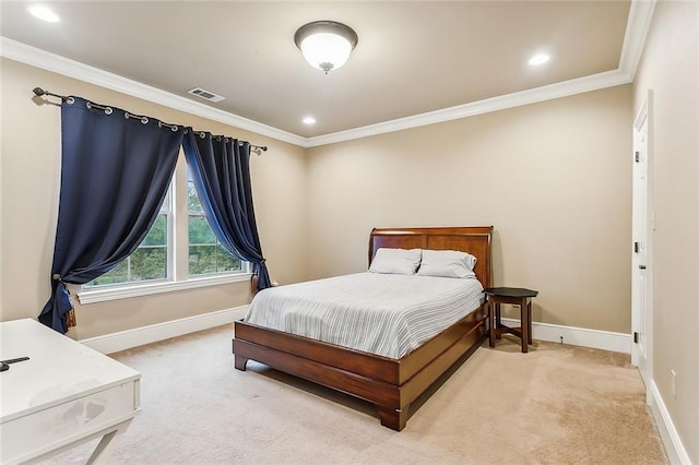 carpeted bedroom with ornamental molding