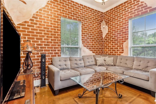 living room with brick wall and crown molding