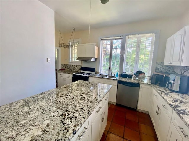 kitchen featuring decorative backsplash, white cabinetry, a sink, white range with gas stovetop, and dishwasher