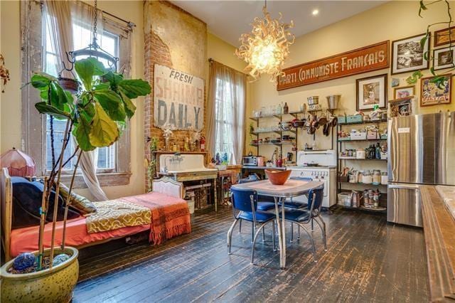 interior space featuring a notable chandelier and dark hardwood / wood-style floors