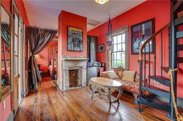 sitting room with hardwood / wood-style floors and a fireplace