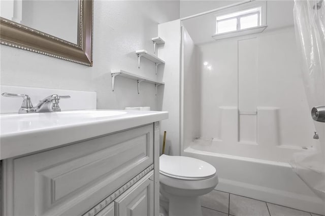 full bathroom featuring toilet, shower / tub combo, vanity, and tile patterned floors