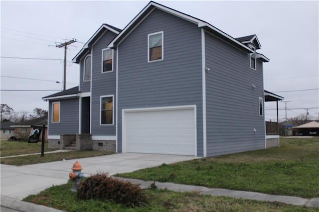 view of side of home featuring a lawn, an attached garage, and driveway