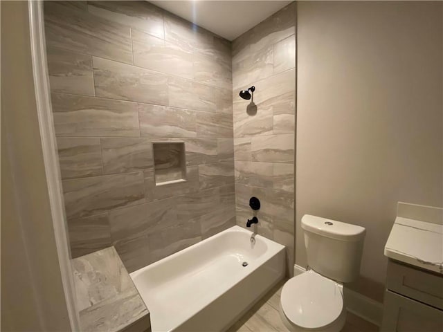 full bathroom featuring shower / tub combination, toilet, vanity, and baseboards