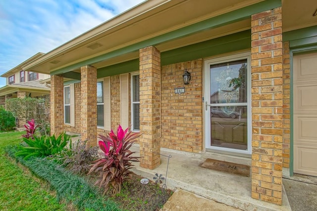 entrance to property with a porch