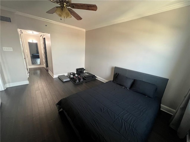 bedroom featuring ceiling fan, dark wood-type flooring, and crown molding