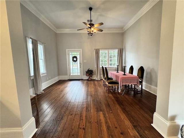 dining room with crown molding, ceiling fan, and dark hardwood / wood-style flooring