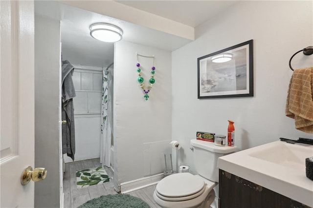 full bathroom with vanity, toilet, and shower / tub combo