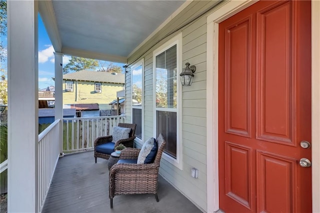 balcony featuring a porch