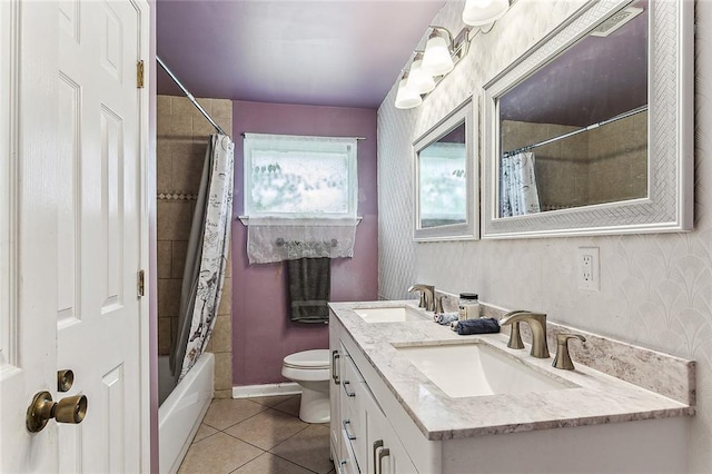 full bathroom with vanity, shower / tub combo, tile patterned floors, and toilet