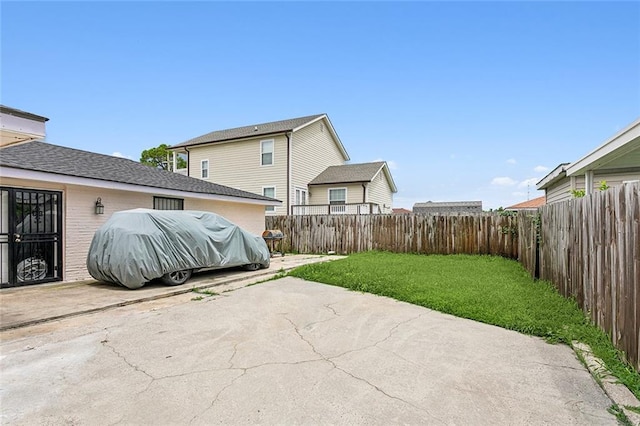 exterior space with a yard and a patio area