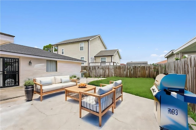 view of patio with an outdoor living space and grilling area