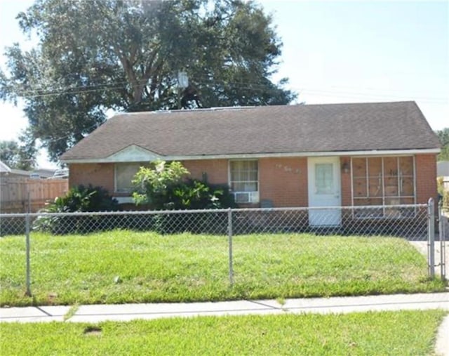 view of front of home with a front lawn