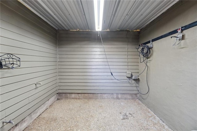 basement with wood walls